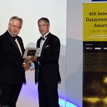 Tony Argyrou accepts award from Steven Norris, chairman of Virtus and chairman of Soho Estates
